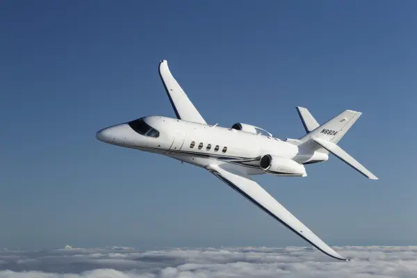 Aerial photography of the Textron Cessna Latitude business jet flying over Keystone Lake, OK. Mid-Continent Airport (ICT) Wichita KS USA